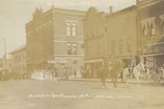 Cadillac-Parade-1912-Memorial-Day-Parade-Intersection-of-Beech-and-North-Mitchell-Street-Masonic-Building-Cummer-Diggins-Office