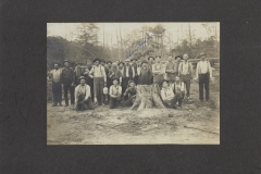 Cadillac-Lumber-Crew-Posing-With-Large-Stump