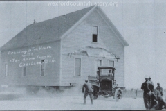 Cadillac-Business-Acme-Truck-Moving-A-House-2