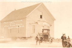 Cadillac-Business-Acme-Truck-Moving-A-House-3
