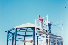 Installing The Clock Tower On The Southeast Corner Of Cass And South Mitchell