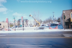 Installing The Clock Tower On The Southeast Corner Of Cass And South Mitchell