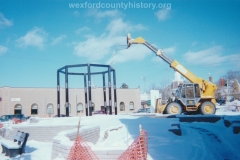 Installing The Clock Tower On The Southeast Corner Of Cass And South Mitchell