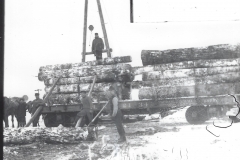 Cadillac-Lumber-Stacking-Logs-2