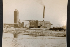 Cadillac-Lumber-Cobbs-And-Mitchell-Sawmille-Number-Two-building-with-three-tops-is-in-both-picture-as-well-as-silo-shaped-burner