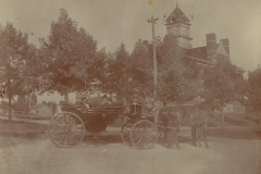 Men In Carriage By The High School